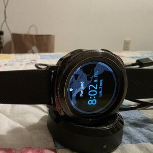 Advanced Black Smartwatch with Charging Stand